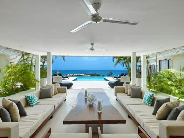 Plenty of comfortable seating under the covered patio at Elysium Villa