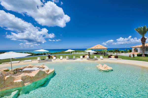 Sandyline Villa on St. Martin Plenty of loungers surround the swimming pool