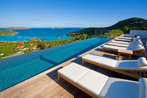 Lounge pool side and enjoy views of St. Jean Bay