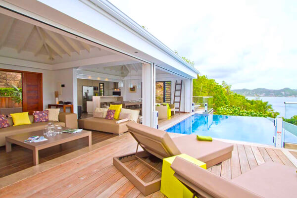 Upside Villa is perched over Pointe Milou overlooking Lorient Bay and out to St. Martin