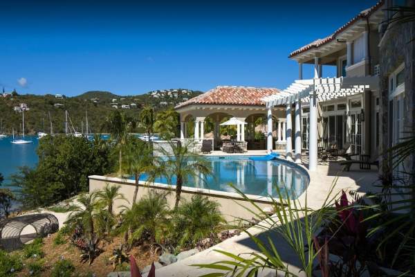 Pool and backyard facing Great Cruz Bay at Ardisia Villa